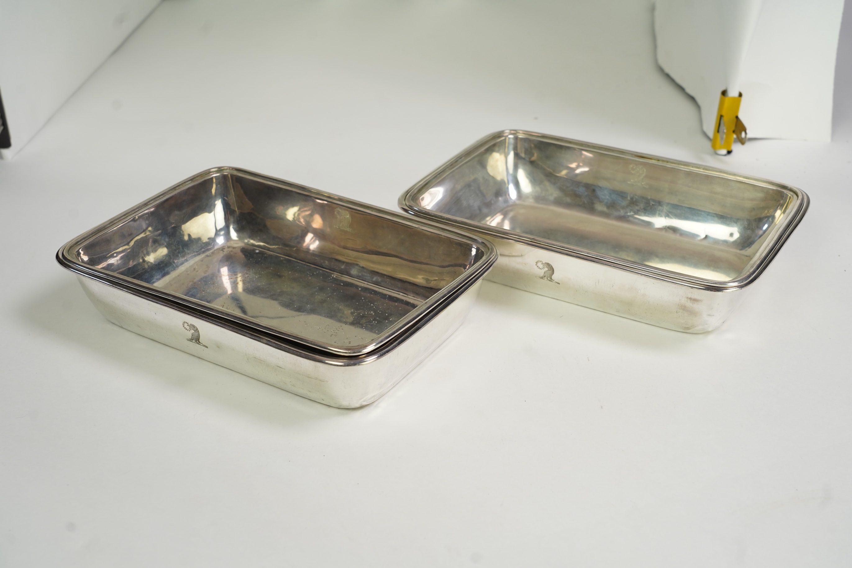 A pair of George IV silver entrée dishes and covers with handles, by John Edward Terry, engraved with the Tregonwell family crest